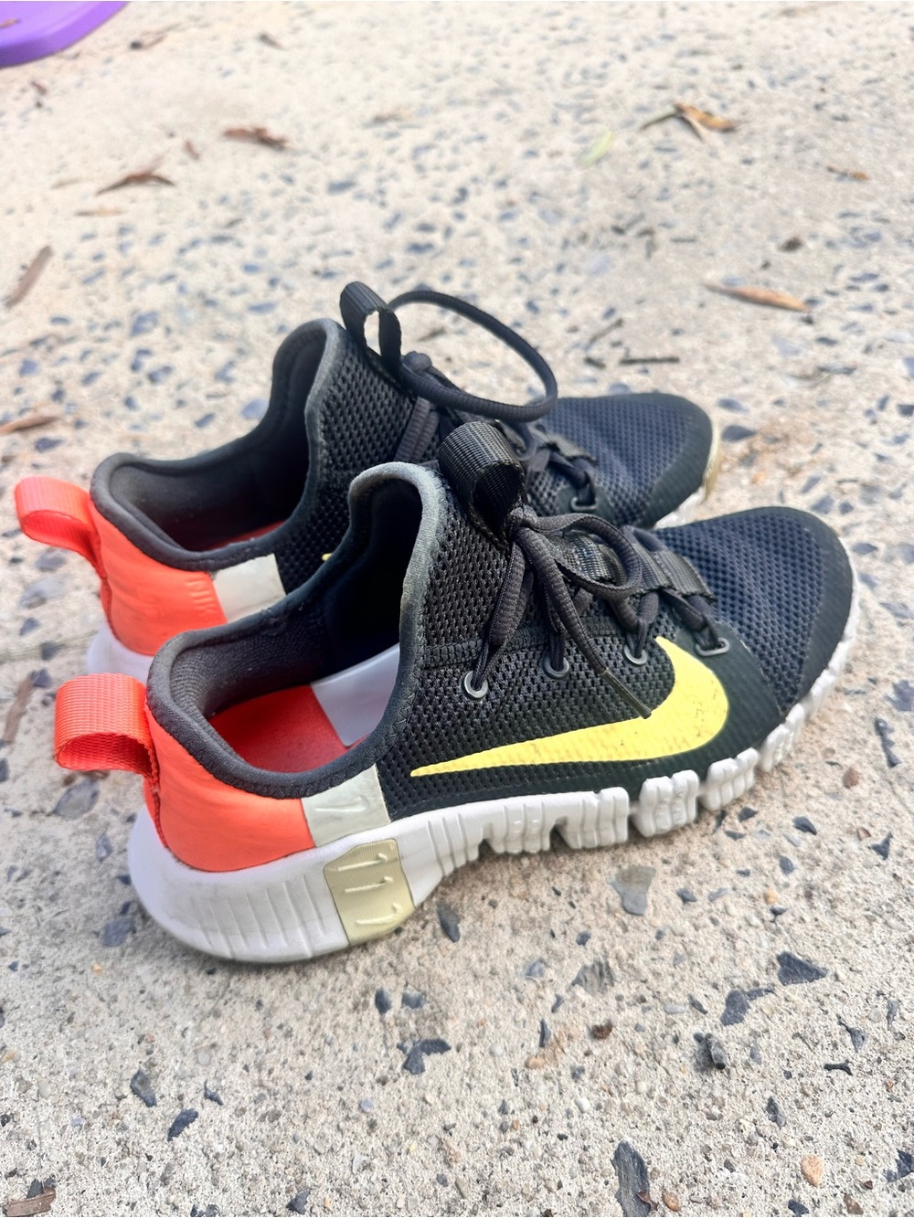 Nike women’s metcon Black Sneakers with Yellow Swoosh and Coral Heel